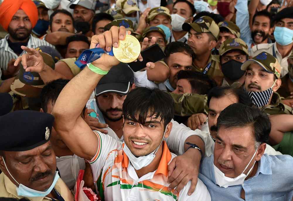 Olympic hero Neeraj Chopra mobbed by fans in Delhi Airport